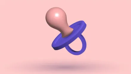 A 3D baby's pacifier, pink teat and blue shield